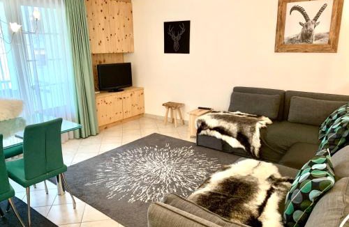 Davos-Platz Apartment | Holiday Apartment Gian - close to the Kongresshaus, the ice hockey stadium, cross-country skiing, the Eau-la-la indoor pool and wellness, large supermarket, 2 bus stops, with an indoor garage and fully equipped