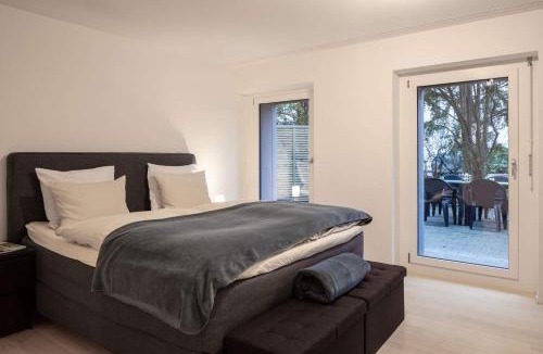 Sankt Alban Apartment | 2,5 Zi Design Loft Wohnung mit Gartensitzplatz