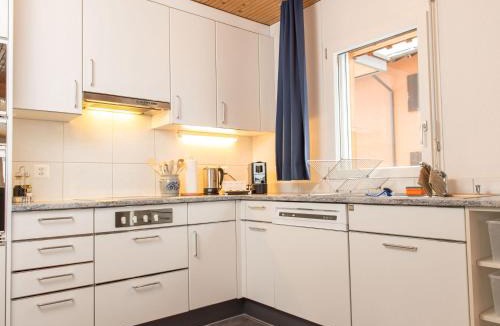 Wassen Apartment | Ferienwohnung Gästehaus Fürlauwi